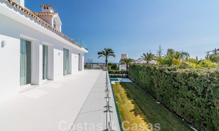 Unieke luxevilla te koop in een moderne, Andalusische bouwstijl, met zeezicht, op loopafstand van Puerto Banus, Marbella 45887 