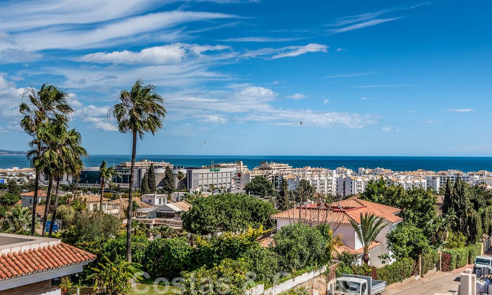 Unieke luxevilla te koop in een moderne, Andalusische bouwstijl, met zeezicht, op loopafstand van Puerto Banus, Marbella 45904