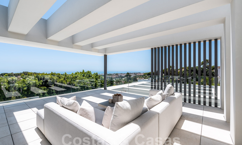 Nieuwe, modernistische designervilla te koop met panoramisch uitzicht, op de New Golden Mile in Marbella - Benahavis 53661