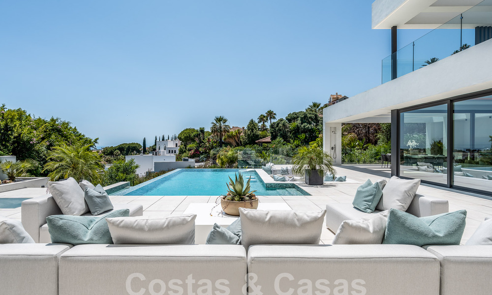Nieuwe, modernistische designervilla te koop met panoramisch uitzicht, op de New Golden Mile in Marbella - Benahavis 53668