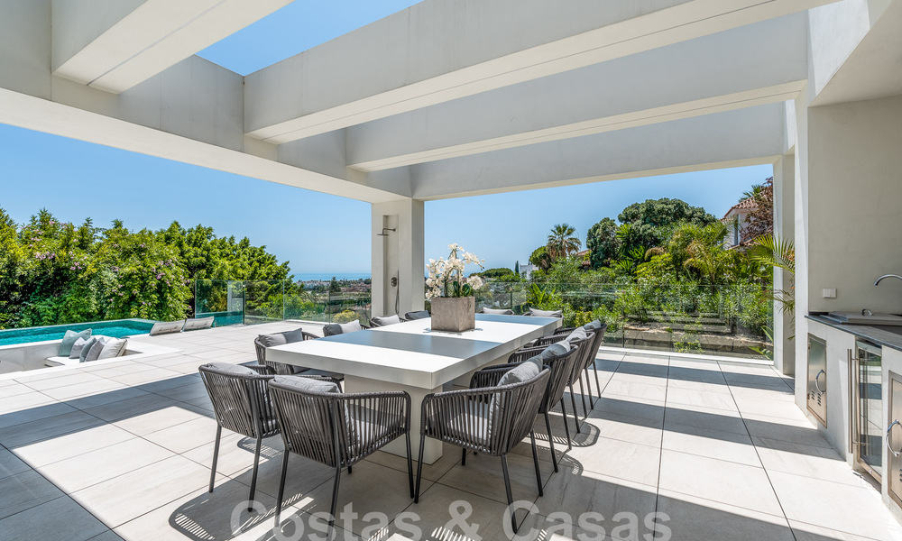 Nieuwe, modernistische designervilla te koop met panoramisch uitzicht, op de New Golden Mile in Marbella - Benahavis 53673
