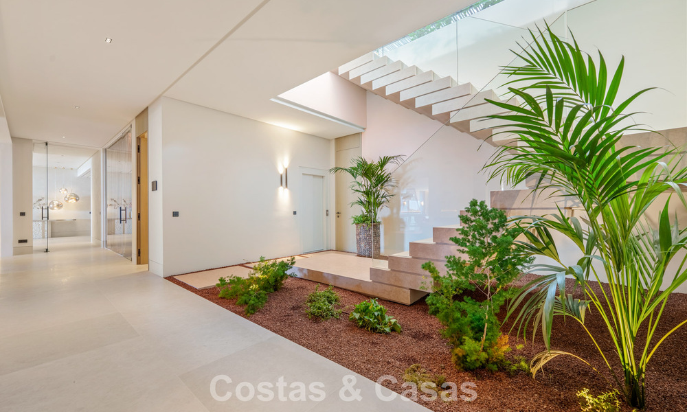 Majestueuze, eigentijdse nieuwbouwvilla te koop met subliem zeezicht in de heuvels van La Quinta te Benahavis - Marbella 786671
