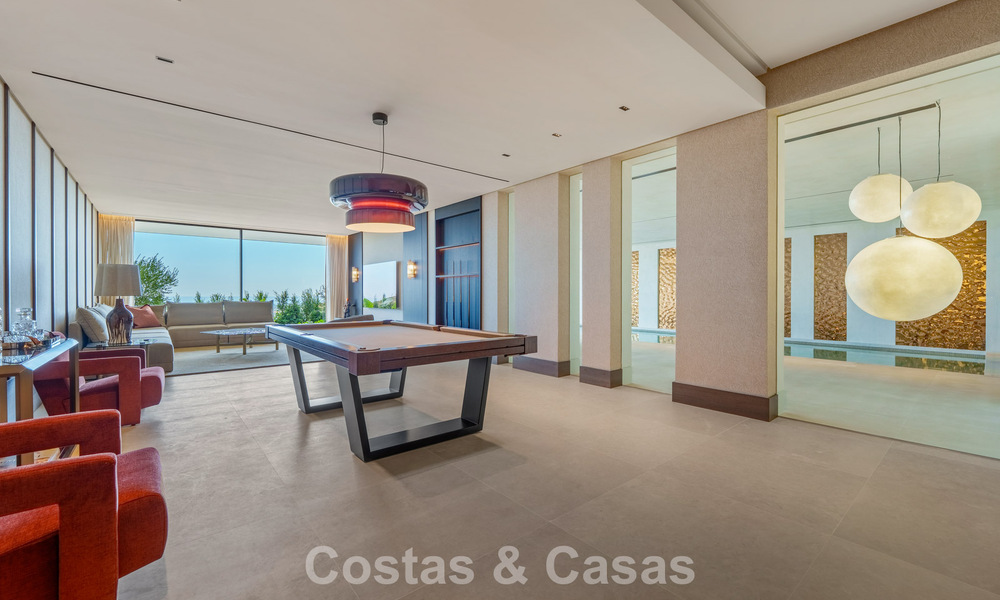 Majestueuze, eigentijdse nieuwbouwvilla te koop met subliem zeezicht in de heuvels van La Quinta te Benahavis - Marbella 786673