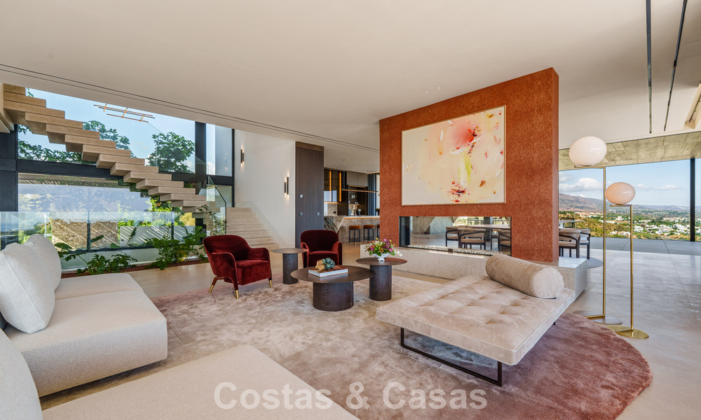 Majestueuze, eigentijdse nieuwbouwvilla te koop met subliem zeezicht in de heuvels van La Quinta te Benahavis - Marbella 786706