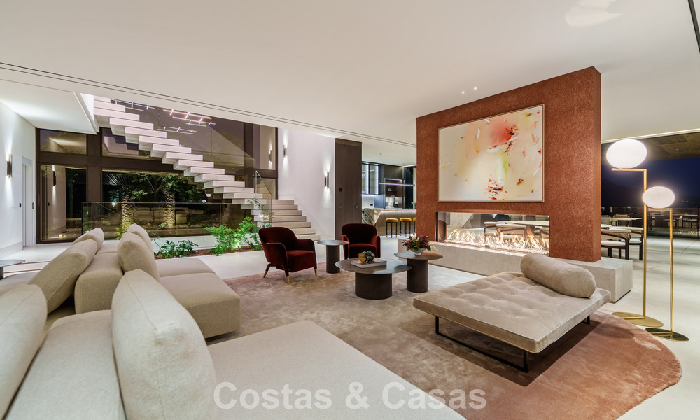 Majestueuze, eigentijdse nieuwbouwvilla te koop met subliem zeezicht in de heuvels van La Quinta te Benahavis - Marbella 786717