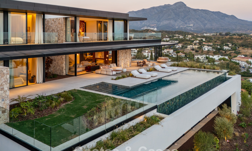 Majestueuze, eigentijdse nieuwbouwvilla te koop met subliem zeezicht in de heuvels van La Quinta te Benahavis - Marbella 786723