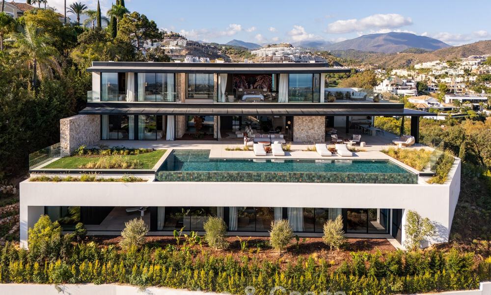 Majestueuze, eigentijdse nieuwbouwvilla te koop met subliem zeezicht in de heuvels van La Quinta te Benahavis - Marbella 786724