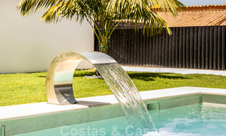 Prachtige, gelijkvloerse, modern Andalusische villa te koop, op loopafstand van het strand in Elviria, ten oosten van Marbella centrum 46911 