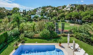 Charmante, Andalusische villa te koop met rustgevend uitzicht op de golfbanen in een begeerde woonwijk in La Quinta, Benahavis - Marbella 47696 