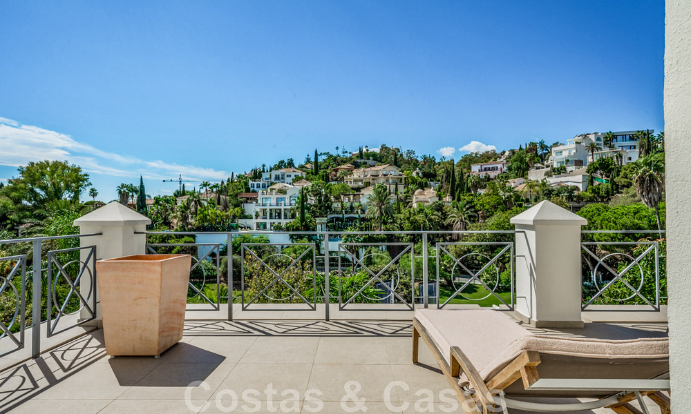 Charmante, Andalusische villa te koop met rustgevend uitzicht op de golfbanen in een begeerde woonwijk in La Quinta, Benahavis - Marbella 47697
