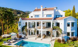 Voortreffelijke luxevilla te koop in een Mediterrane stijl met een eigentijds design op een verhoogde positie in El Madroñal, Benahavis - Marbella 48111 