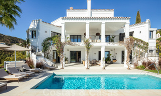 Voortreffelijke luxevilla te koop in een Mediterrane stijl met een eigentijds design op een verhoogde positie in El Madroñal, Benahavis - Marbella 48116 