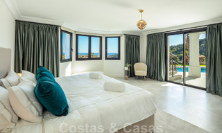 Voortreffelijke luxevilla te koop in een Mediterrane stijl met een eigentijds design op een verhoogde positie in El Madroñal, Benahavis - Marbella 48124 