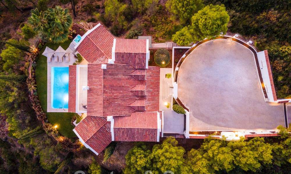 Voortreffelijke luxevilla te koop in een Mediterrane stijl met een eigentijds design op een verhoogde positie in El Madroñal, Benahavis - Marbella 48132