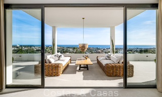 Exclusieve designvilla met panoramisch zeezicht te koop in het een vijfsterren golfresort in Marbella - Benahavis 48887 