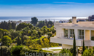 Eerstelijns golf luxevilla in een elegante moderne stijl met prachtig golf- en zeezicht te koop in Los Flamingos Golfresort in Marbella - Benahavis 48941 