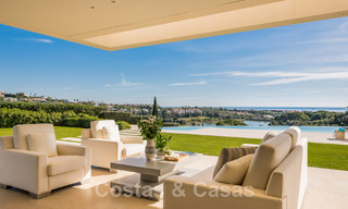 Eerstelijns golf luxevilla in een elegante moderne stijl met prachtig golf- en zeezicht te koop in Los Flamingos Golfresort in Marbella - Benahavis 48971 