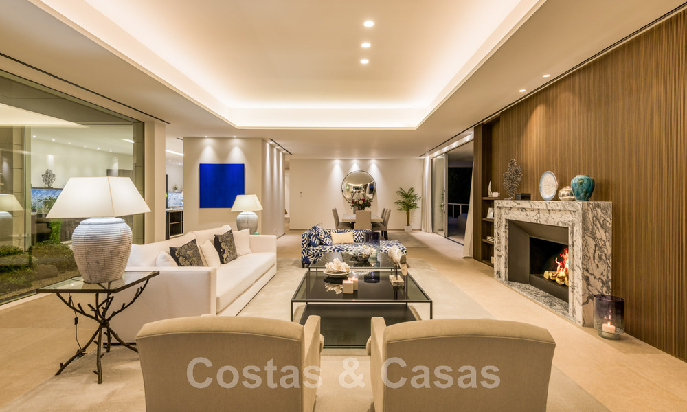 Eerstelijns golf luxevilla in een elegante moderne stijl met prachtig golf- en zeezicht te koop in Los Flamingos Golfresort in Marbella - Benahavis 48980