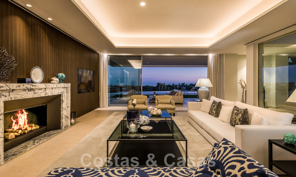 Eerstelijns golf luxevilla in een elegante moderne stijl met prachtig golf- en zeezicht te koop in Los Flamingos Golfresort in Marbella - Benahavis 48983