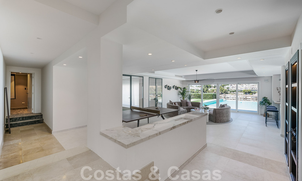 Elegante, Spaanse luxevilla te koop met privé tennisbaan in een afgesloten woonwijk in La Quinta, Benahavis - Marbella 50434