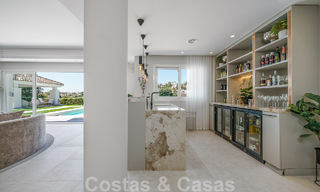 Elegante, Spaanse luxevilla te koop met privé tennisbaan in een afgesloten woonwijk in La Quinta, Benahavis - Marbella 50437 