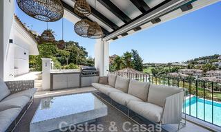 Elegante, Spaanse luxevilla te koop met privé tennisbaan in een afgesloten woonwijk in La Quinta, Benahavis - Marbella 50453 