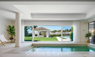 Elegante, Spaanse luxevilla te koop met privé tennisbaan in een afgesloten woonwijk in La Quinta, Benahavis - Marbella 50455 