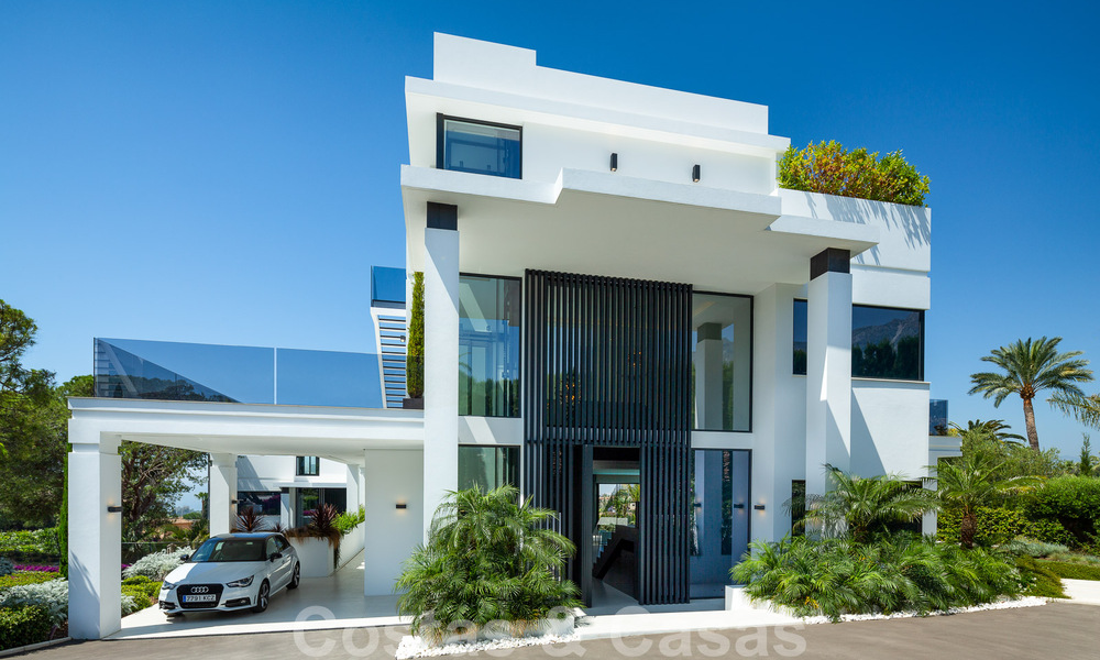 Contemporaine, vrijstaande luxevilla te koop met panoramisch berg- en zeezicht, hartje Golden Mile van Marbella 49882