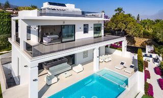 Contemporaine, vrijstaande luxevilla te koop met panoramisch berg- en zeezicht, hartje Golden Mile van Marbella 49897 