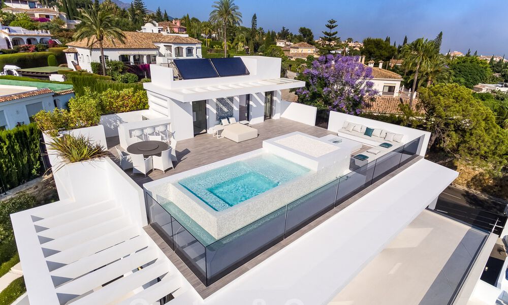 Contemporaine, vrijstaande luxevilla te koop met panoramisch berg- en zeezicht, hartje Golden Mile van Marbella 49898