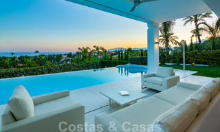 Contemporaine, vrijstaande luxevilla te koop met panoramisch berg- en zeezicht, hartje Golden Mile van Marbella 49901 