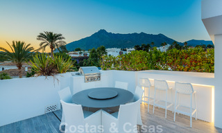 Contemporaine, vrijstaande luxevilla te koop met panoramisch berg- en zeezicht, hartje Golden Mile van Marbella 49903 