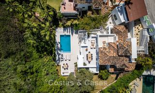 Nieuwe luxevilla te koop met een contemporaine bouwstijl gelegen in een beveiligde community van Nueva Andalucia, Marbella 782506 