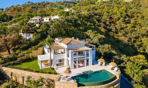 Sublieme Mediterrane luxevilla met gastenverblijf en prachtig zeezicht te koop in El Madroñal, Marbella - Benahavis 51545