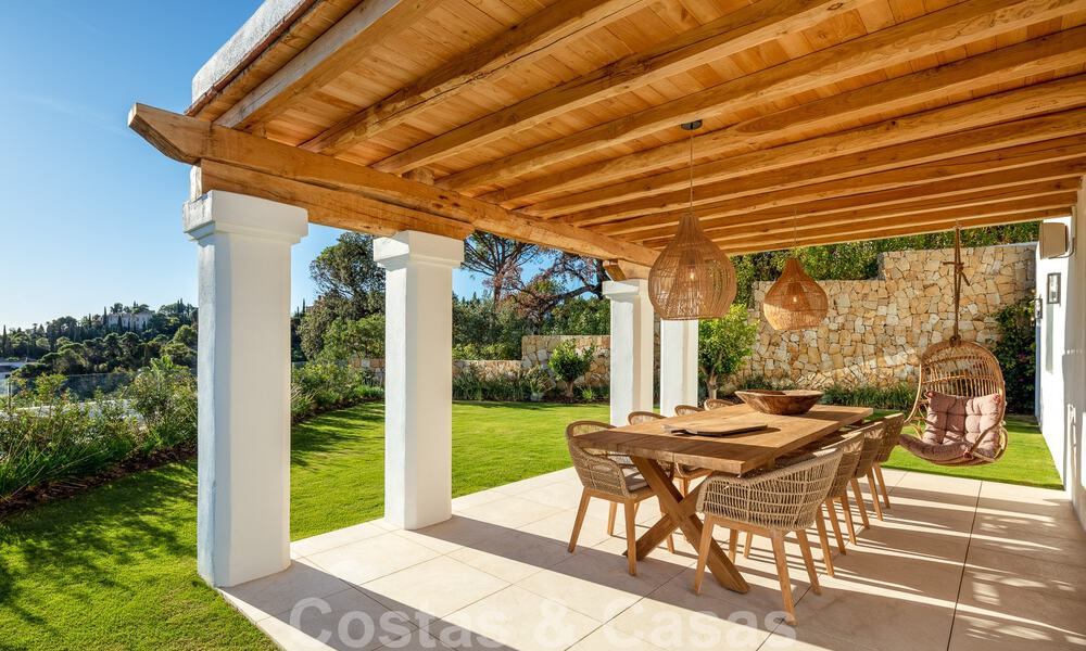 Sublieme Mediterrane luxevilla met gastenverblijf en prachtig zeezicht te koop in El Madroñal, Marbella - Benahavis 51551