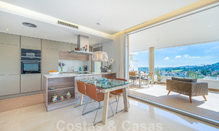 Instapklaar, verhoogd begane grond appartement te koop met weids uitzicht op de vallei en de zee in het exclusieve Benahavis - Marbella 53318 