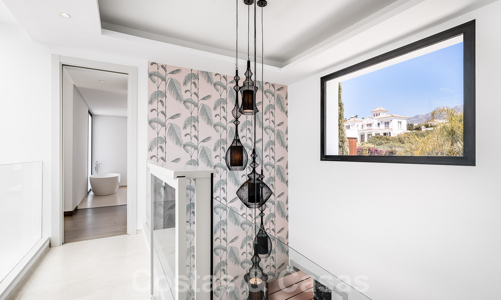 Moderne luxevilla te koop in een afgesloten wijk van de golfvallei van Nueva Andalucia, Marbella 53504