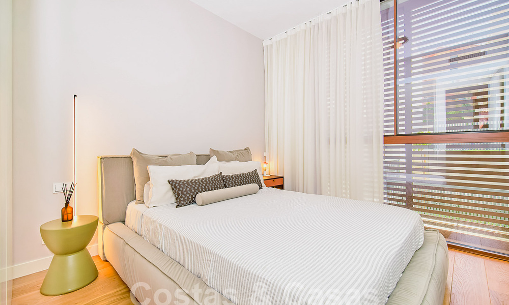 Moderne halfvrijstaande villa te koop, op loopafstand van Puente Romano op de Golden Mile van Marbella 52722