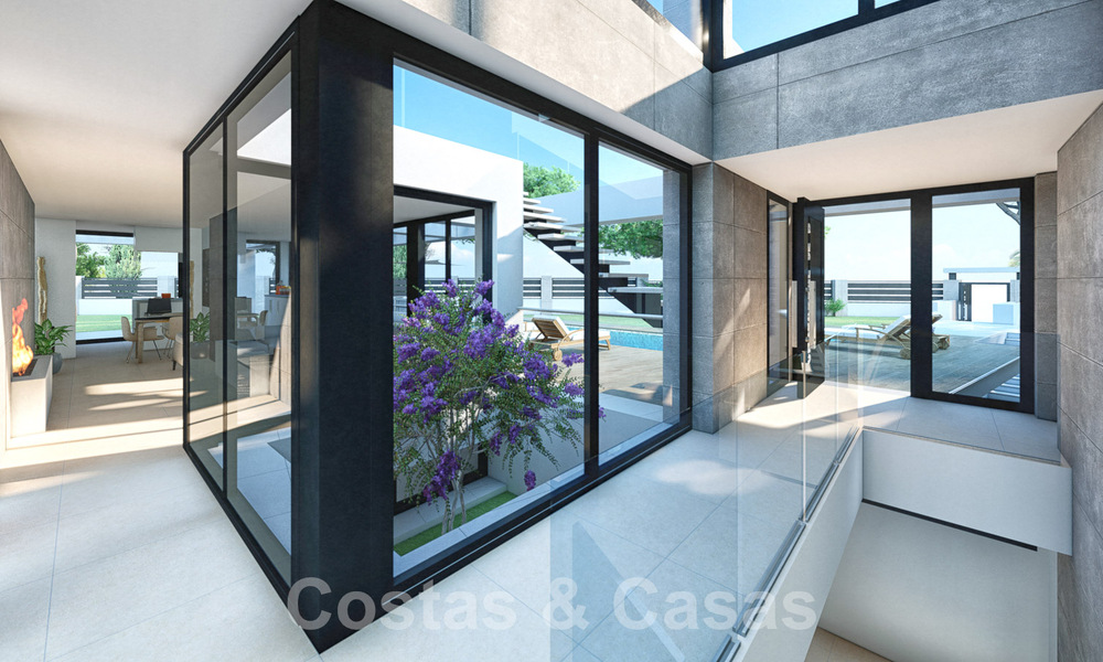 3 Nieuwe designervilla’s te koop op een steenworp van de golfbaan in een luxueus resort in Mijas, Costa del Sol 53568