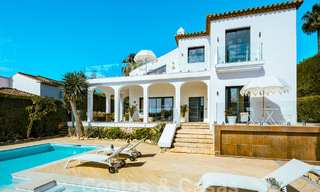 Luxueuze villa te koop met een traditionele bouwstijl gelegen in een gated community van Nueva Andalucia, Marbella 53693 