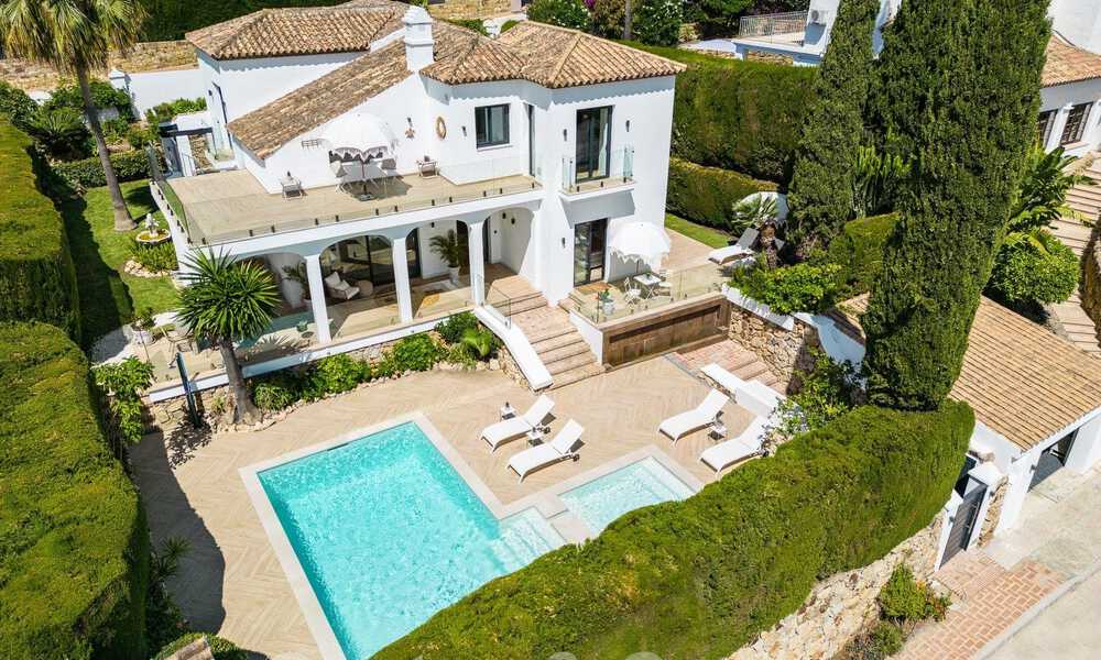 Luxueuze villa te koop met een traditionele bouwstijl gelegen in een gated community van Nueva Andalucia, Marbella 53695