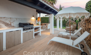 Luxueuze villa te koop met een traditionele bouwstijl gelegen in een gated community van Nueva Andalucia, Marbella 53708 