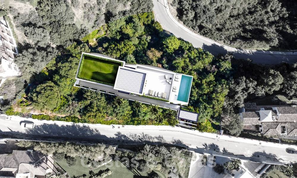 Ecologische luxevilla met een ultra modern design te koop met prachtig uitzicht op zee en de bergen in Benahavis - Marbella 52071