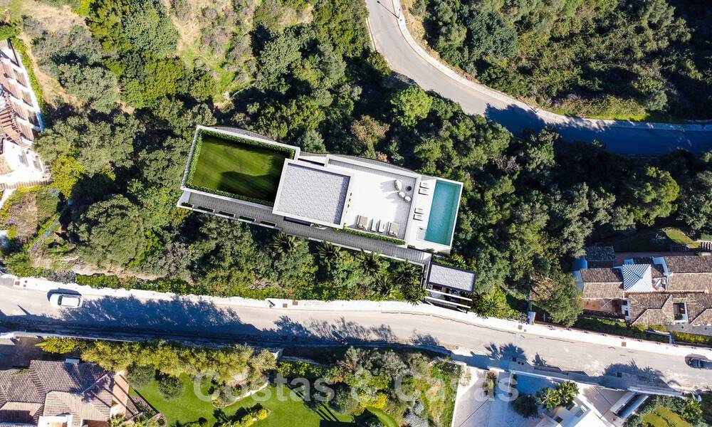 Ecologische luxevilla met een ultra modern design te koop met prachtig uitzicht op zee en de bergen in Benahavis - Marbella 52072