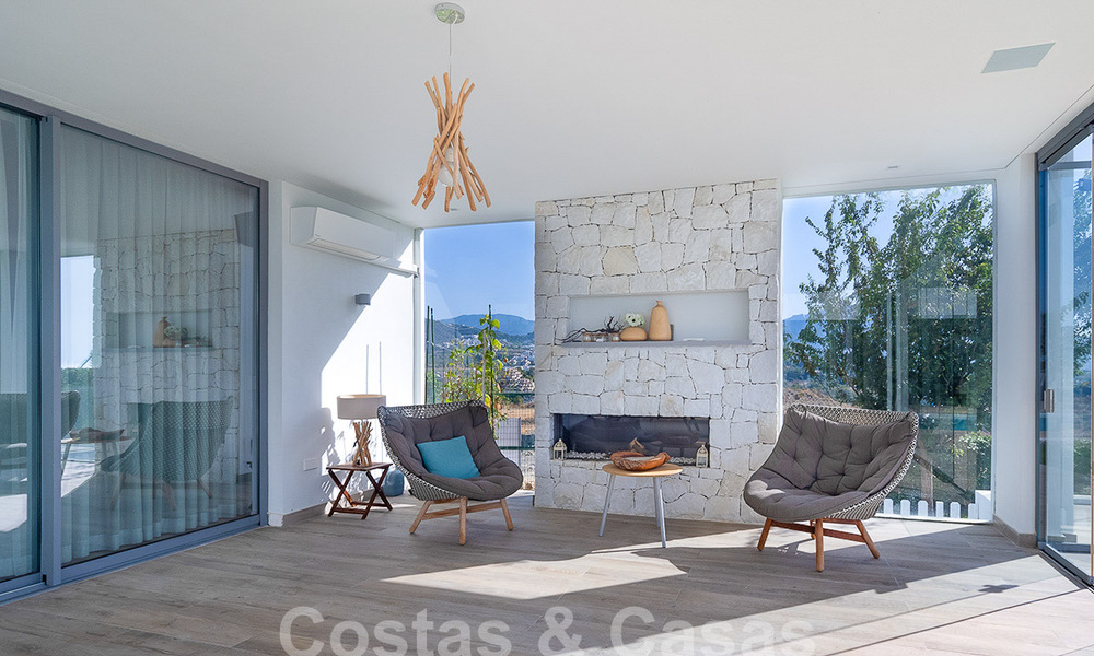 Moderne luxevilla te koop met schitterend zeezicht in een exclusieve wijk van Benahavis - Marbella 53359