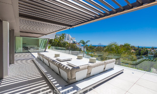 Instapklare, nieuwe, moderne luxevilla met 6 slaapkamers te koop met zeezicht in La Quinta, Marbella - Benahavis 54304 