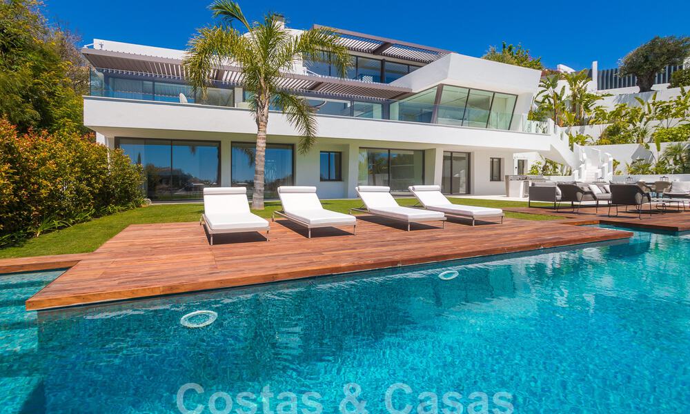 Instapklare, nieuwe, moderne luxevilla met 6 slaapkamers te koop met zeezicht in La Quinta, Marbella - Benahavis 54310