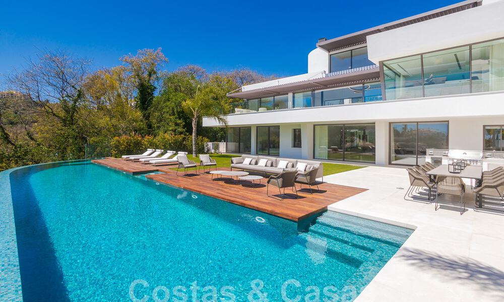 Instapklare, nieuwe, moderne luxevilla met 6 slaapkamers te koop met zeezicht in La Quinta, Marbella - Benahavis 54312