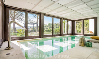Boutique villa in resortstijl te koop met open zeezicht, genesteld in het weelderig groen van het exclusieve La Zagaleta golfresort, Marbella - Benahavis 54064 