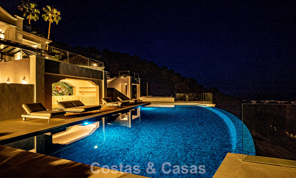 Boutique villa in resortstijl te koop met open zeezicht, genesteld in het weelderig groen van het exclusieve La Zagaleta golfresort, Marbella - Benahavis 54119